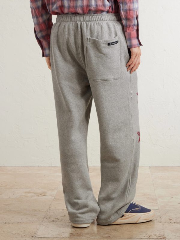 Youth Enrichment Wide-Leg Logo-Print Distressed Cotton Sweatpants - BK Youth Enrichment Wide-Leg Logo-Print Distressed Cotton Sweatpants - BK