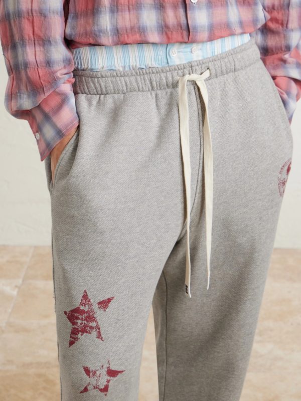 Youth Enrichment Wide-Leg Logo-Print Distressed Cotton Sweatpants - CU Youth Enrichment Wide-Leg Logo-Print Distressed Cotton Sweatpants - CU
