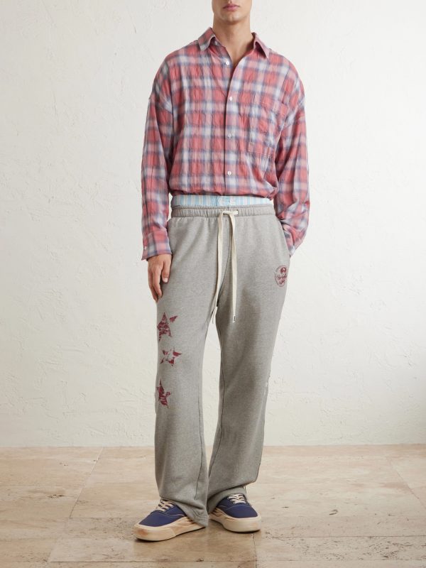 Youth Enrichment Wide-Leg Logo-Print Distressed Cotton Sweatpants - OU Youth Enrichment Wide-Leg Logo-Print Distressed Cotton Sweatpants - OU