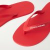 Logo-Embossed Rubber Flip Flops - CU