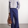 Wide-Leg Logo-Print Cotton-Blend Sweatpants - OU Wide-Leg Logo-Print Cotton-Blend Sweatpants - OU