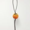 Persimmon Crocheted Cotton and Leather Bag Charm Persimmon Crocheted Cotton and Leather Bag Charm