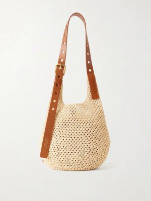 + Paula's Ibiza The Punch Hole Leather-Trimmed Raffia Tote + Paula's Ibiza The Punch Hole Leather-Trimmed Raffia Tote