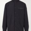 Yndale Logo-Appliquéd Leather-Trimmed Shell Jacket Yndale Logo-Appliquéd Leather-Trimmed Shell Jacket