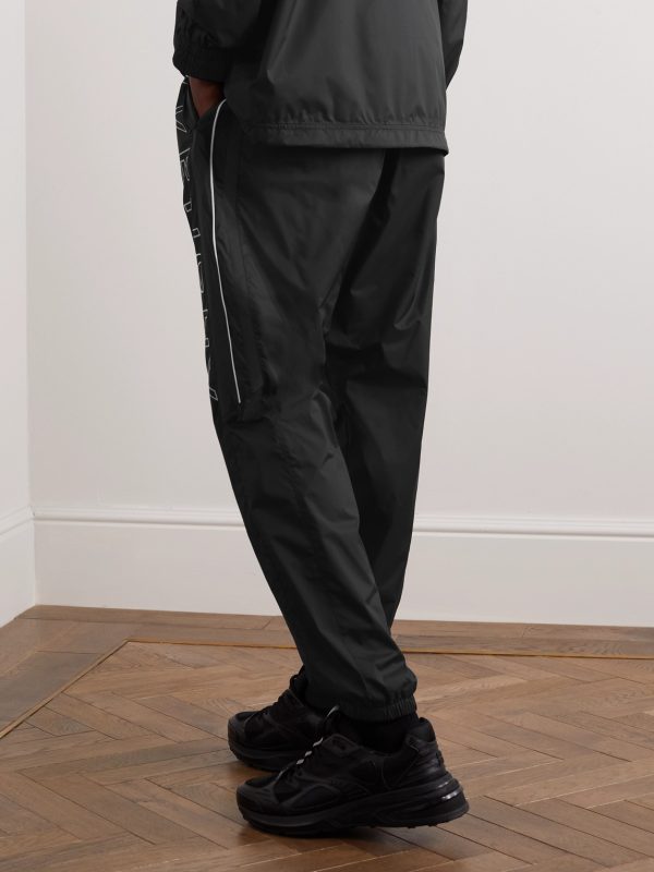 Tapered Logo-Print Shell Track Pants - BK Tapered Logo-Print Shell Track Pants - BK