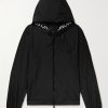 Junichi Logo-Appliquéd Shell Hooded Jacket Junichi Logo-Appliquéd Shell Hooded Jacket