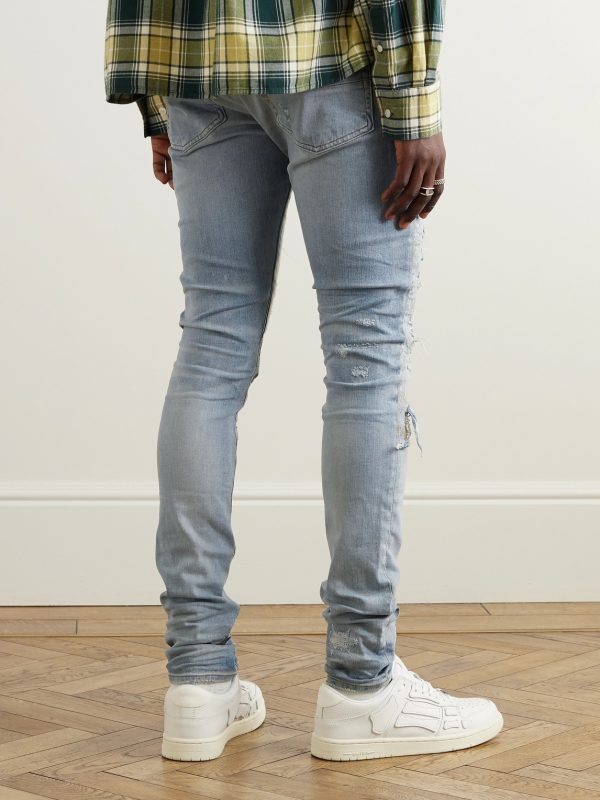 Skinny-Fit Logo-Embroidered Distressed Patchwork Jeans - BK Skinny-Fit Logo-Embroidered Distressed Patchwork Jeans - BK