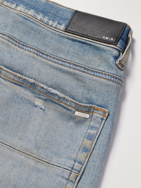 Skinny-Fit Logo-Embroidered Distressed Patchwork Jeans - CU Skinny-Fit Logo-Embroidered Distressed Patchwork Jeans - CU