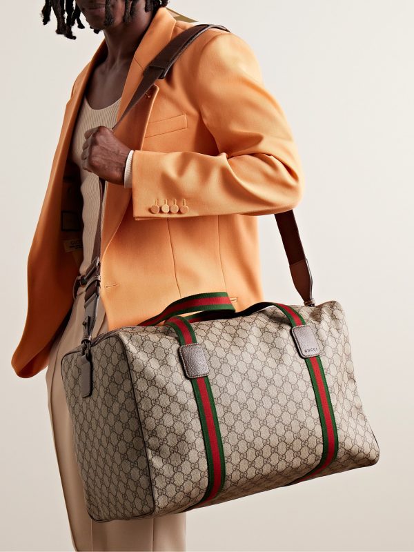 Leather- and Webbing-Trimmed Monogrammed Supreme Coated-Canvas Holdall - E2 Leather- and Webbing-Trimmed Monogrammed Supreme Coated-Canvas Holdall - E2