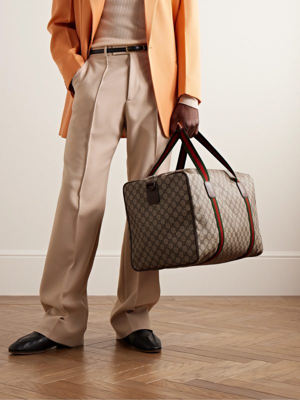 Leather- and Webbing-Trimmed Monogrammed Supreme Coated-Canvas Holdall - OU Leather- and Webbing-Trimmed Monogrammed Supreme Coated-Canvas Holdall - OU