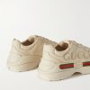 Rhyton Logo-Print Leather Sneakers - BK Rhyton Logo-Print Leather Sneakers - BK